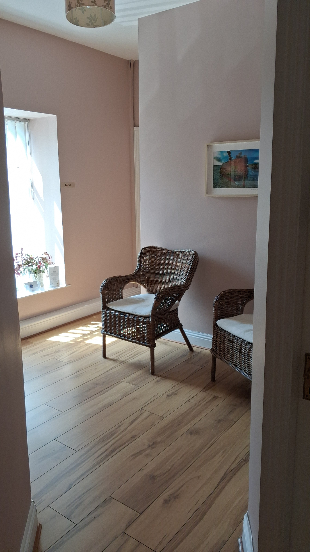 The waiting room at RC Psychotherapy in Gorey — softly lit with comfortable seating